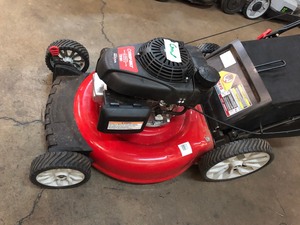 lot 201 image: Troy-Bilt 21 in. 160 cc Honda Gas Walk Behind Push Mower with High Rear Wheels and 3-in-1 Cutting TriAction Cutting System In working condition see pics 