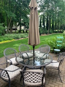 lot 18 image: Round Patio Table and Six Chairs