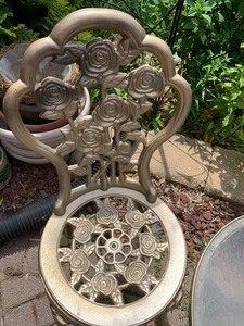 lot 36 image: Petite Table and Two Ornate Metal Chairs