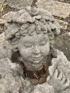 lot 67 image: Sleeping Cherub Cement Figurine