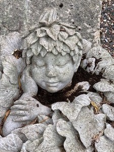 lot 68 image: Sleeping Cherub Figurine