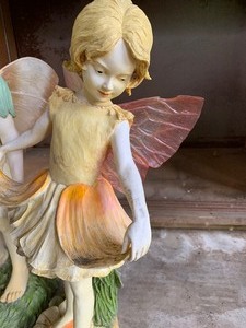 lot 99 image: Two Whimsical Fairy Figurines