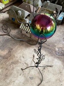 lot 94 image: Decoraitive Metal Stand and Gazing Ball