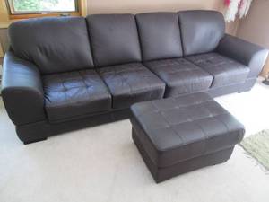 lot 38 image: 2 PC. Leather Couch & Footstool (Each Section of Couch is 56 X 36 X 34) Makes a 9 Couch