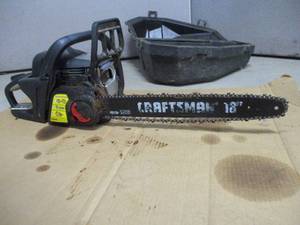 lot 28 image: Craftsman Chain Saw