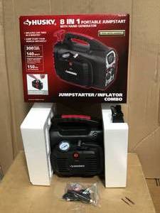 lot 12 image: Husky 8-in-1 12-Volt Power SourceJumpstarter in good condition