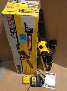 lot 78 image: DEWALT 16 in. 40-Volt MAX Lithium-Ion Cordless Brushless Chainsaw w (1) 4.0 Ah Battery Pack and Charger in good condition