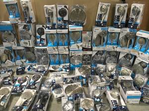 PALLET OF MOEN SHOWER HEADS DIFFERENT SIZES SOME NEW AND SOME NEVER USED