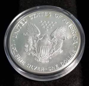 1987 AMERICAN SILVER EAGLE 1 TROY OZ. .999 FINE SILVER IN AIRTITE