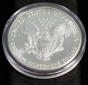 1990 AMERICAN SILVER EAGLE 1 TROY OZ. .999 FINE SILVER IN AIRTITE