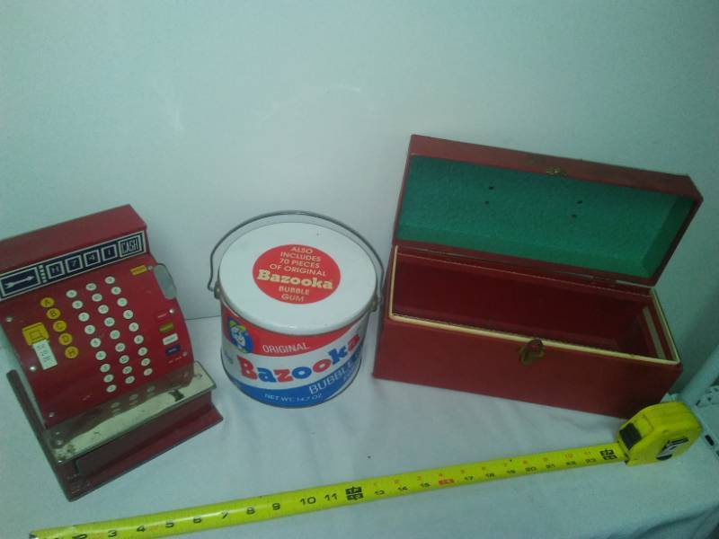 lot 108 image: Bazooka gum can, cash register and box.
