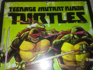 lot 40 image: Teenage Mutant Ninja Turtles Metal Sign Cowabunga