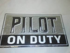lot 53 image: Pilot On Duty metal sign - NEW
