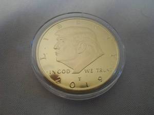 lot 101D image: Trump 2019 coin - gold color.