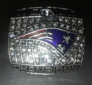 lot 101F image: New England Patriots Tom Brady 2001 Super Bowl ring size 11. NFL.