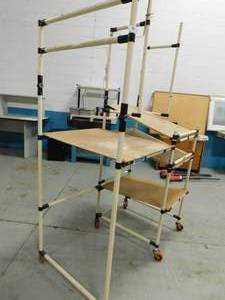 lot 56 image: Rolling Rack with Light - 51(w) x 29(d) x 84(h)