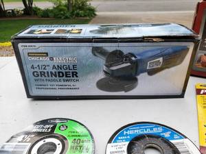 lot 56 image: Angle Grinder  Belt Sander with Disks and belts