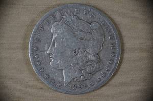 lot 15 image: 1891-O Morgan Silver Dollar