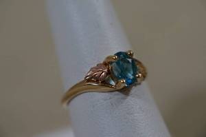lot 11 image: 10K Two-Tone Gold Ladies Gemstone Ring