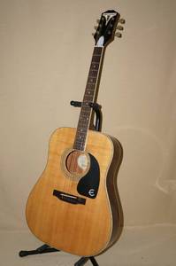 lot 9 image: Epiphone 6 String Acoustic Guitar