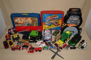 lot 99 image: Large Assortment of Toy Cars and Cases