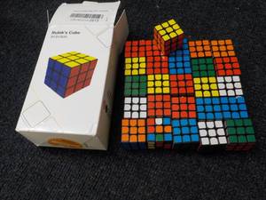 lot 27 image: Box of Rubiks Cubes...