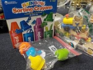 lot 30 image: Rainbox Sorting Crayons and Wood Tr...