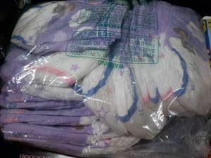 lot 32 image: 2t-3t Diapers VCR Tapes and CDs...