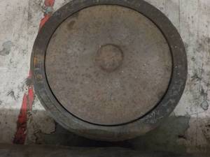 lot 106 image: Cast Iron Sewer Lid 23 diameter...