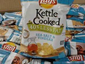 lot 232 image: Case of 64 - 1 38 oz Lays Kettle C...