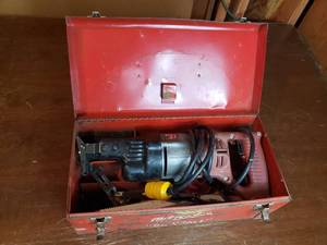 lot 8 image: Milwaukee Sawzall in Metal Box
