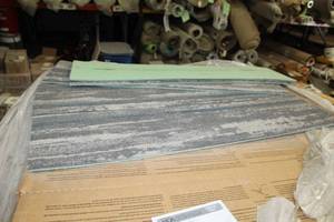 lot 28 image: Lot of (48) Boxes of Carpet Tile Flooring