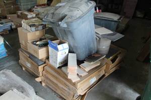 lot 74 image: Lot of (19) Boxes of Loose Rock Tiles, Tile Flooring, Garbage Can, Loose Tiles