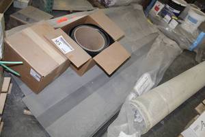 lot 95 image: Lot of (2) Boxes of Tile Flooring, Tarkett VS 40 Stringer Black 600in. Rolls