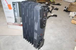 lot 168 image: Sai Oil-Filled Radiator Heater