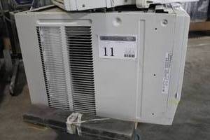 lot 11 image: GE Room Air ConditioningHeater Unit