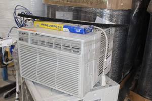 lot 10 image: GE Room Air Conditioning Unit with AC Safe AC-160 Mount For Large Units 12K-24K BTU