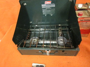 Coleman Camp Stove, 2 Galons of Fuel, GasCharcoal Grill