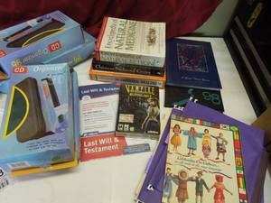 lot 33 image: Natural Medicine and Cures Books, Year Books, CDDVD Organizers, Etc.