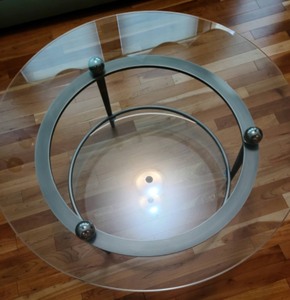 lot 2 image: Round Glass And Metal Coffee Table
