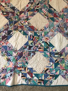 lot 202 image: Multi Colored Quilt