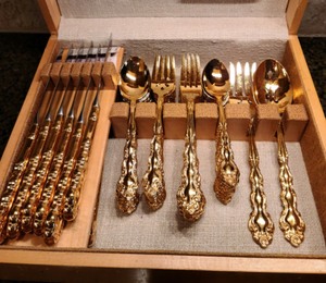 lot 77 image: Oneida Gold Tone Flatware