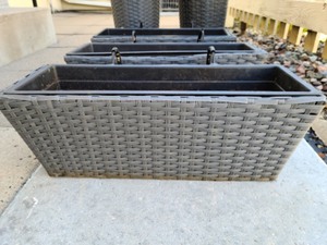 lot 235 image: Pair of Grey Wicker Planters and Three Matching Railing Planters