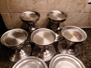 lot 113 image: Decorative Silver Colored Candleholders