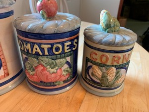 lot 4 image: Four-Piece Decorative Canister Set