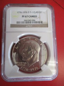 NGC Certified 1776-1976-S Type 1 Eisenhower Dollar in Proof 67 Cameo Condition. NGC certification number 2661042-006. Has the distinctive Moon and Liberty Bell Reverse