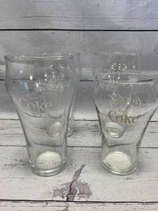 lot 20 image: Lot of 4 1970s or 80s Coca Cola Glasses