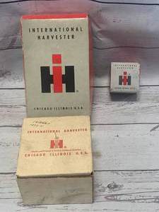 lot 34 image: Vintage International Harvester Boxes