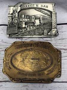 lot 54 image: Oakes North Dakota & Southern Comfort Belt Buckle