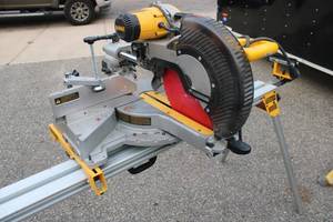 lot 10 image: Dewalt 12 Double Bevel Compound Miter Saw